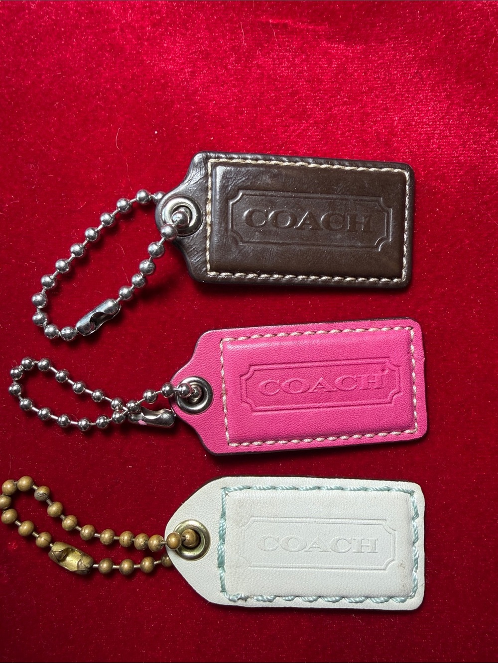 COACH Trio Leather Key Tags in Brown, Pink & White